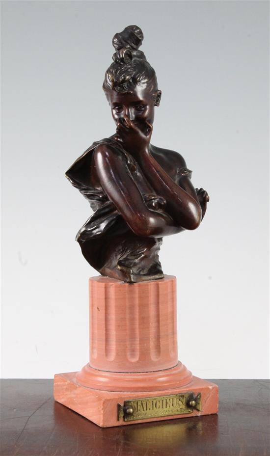 After Georges van der Straeten, Malicieuse. A patinated bronze bust of a young lady,